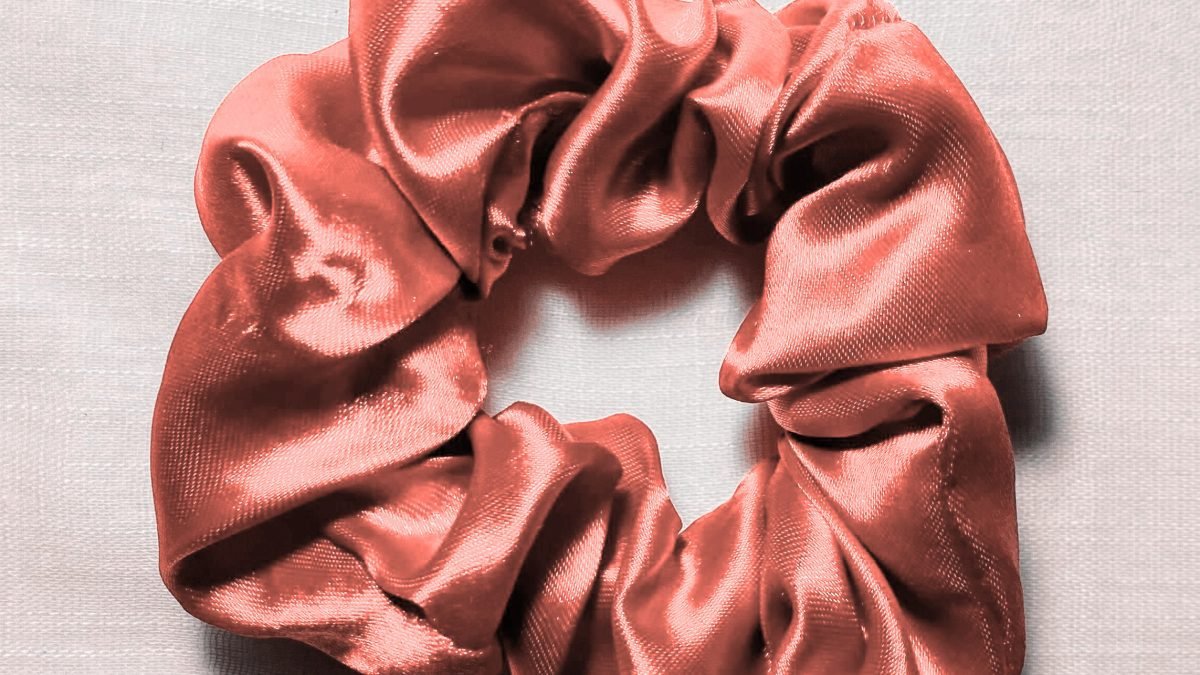 Collection of stylish scrunchies available for reducing hair breakage and boosting hair care.